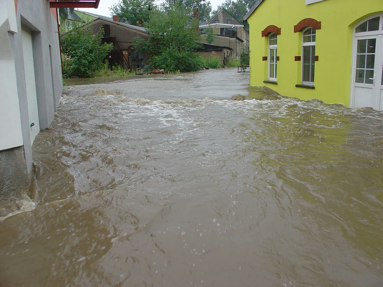 August 2010 — the water is lapping at the buildings in Oppach