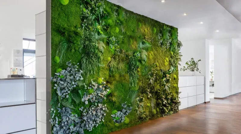 Preserved moss wall by MOOSMOOS featuring ferns and preserved plants — no technical elements