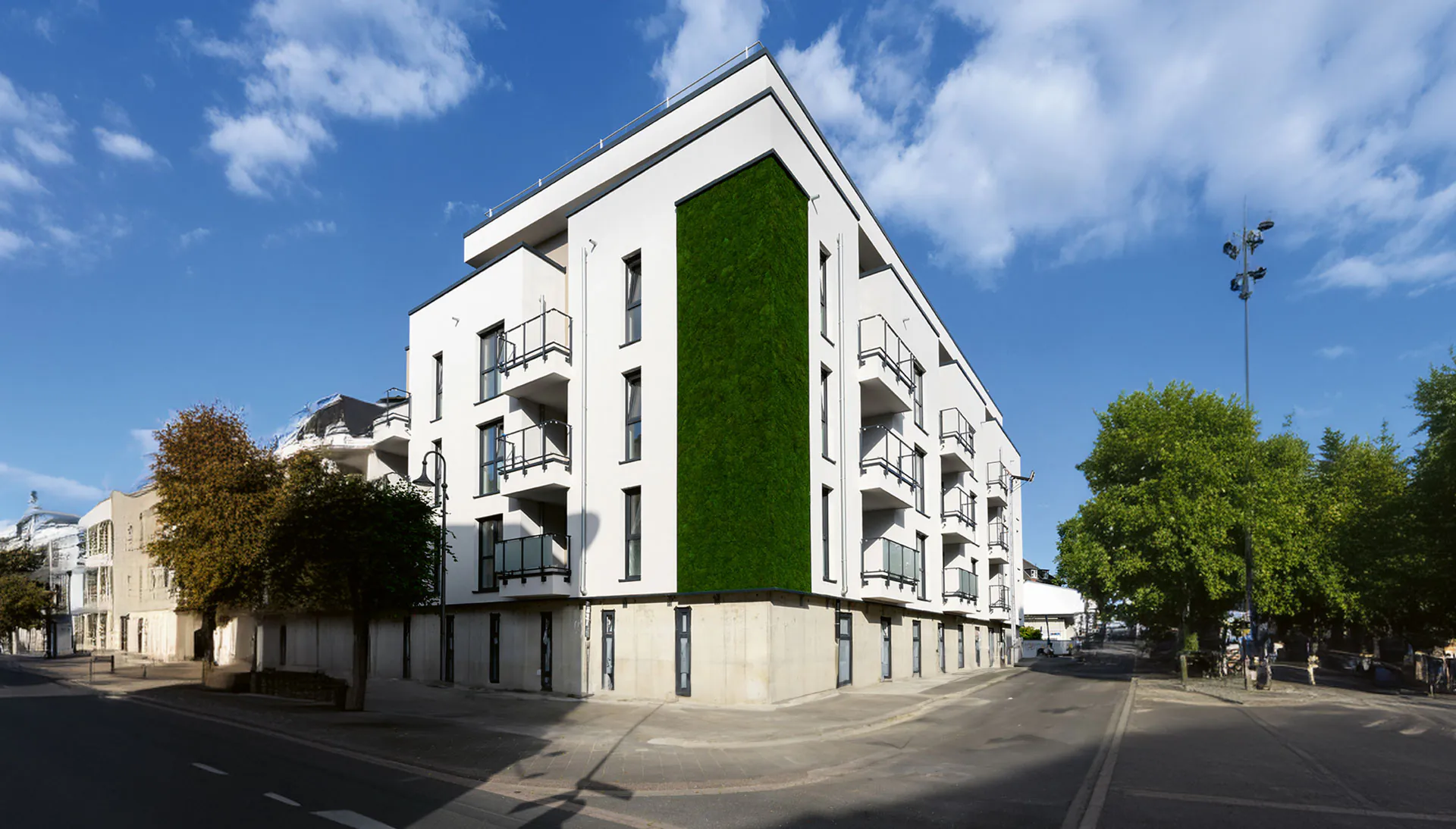 Green architecture projects — Residential building with a moss façade
