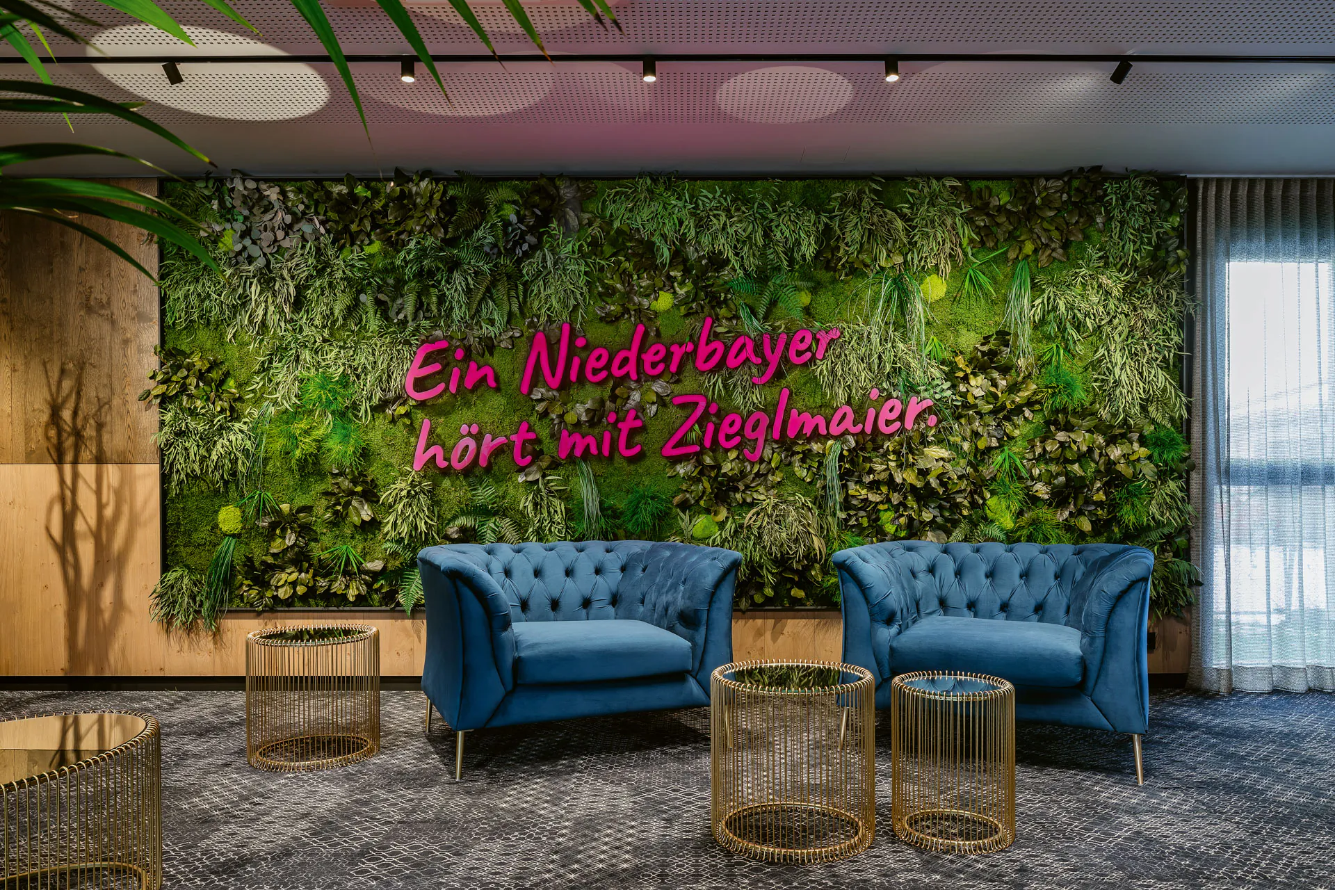 Logo in the reception area — Moss logo · Showroom