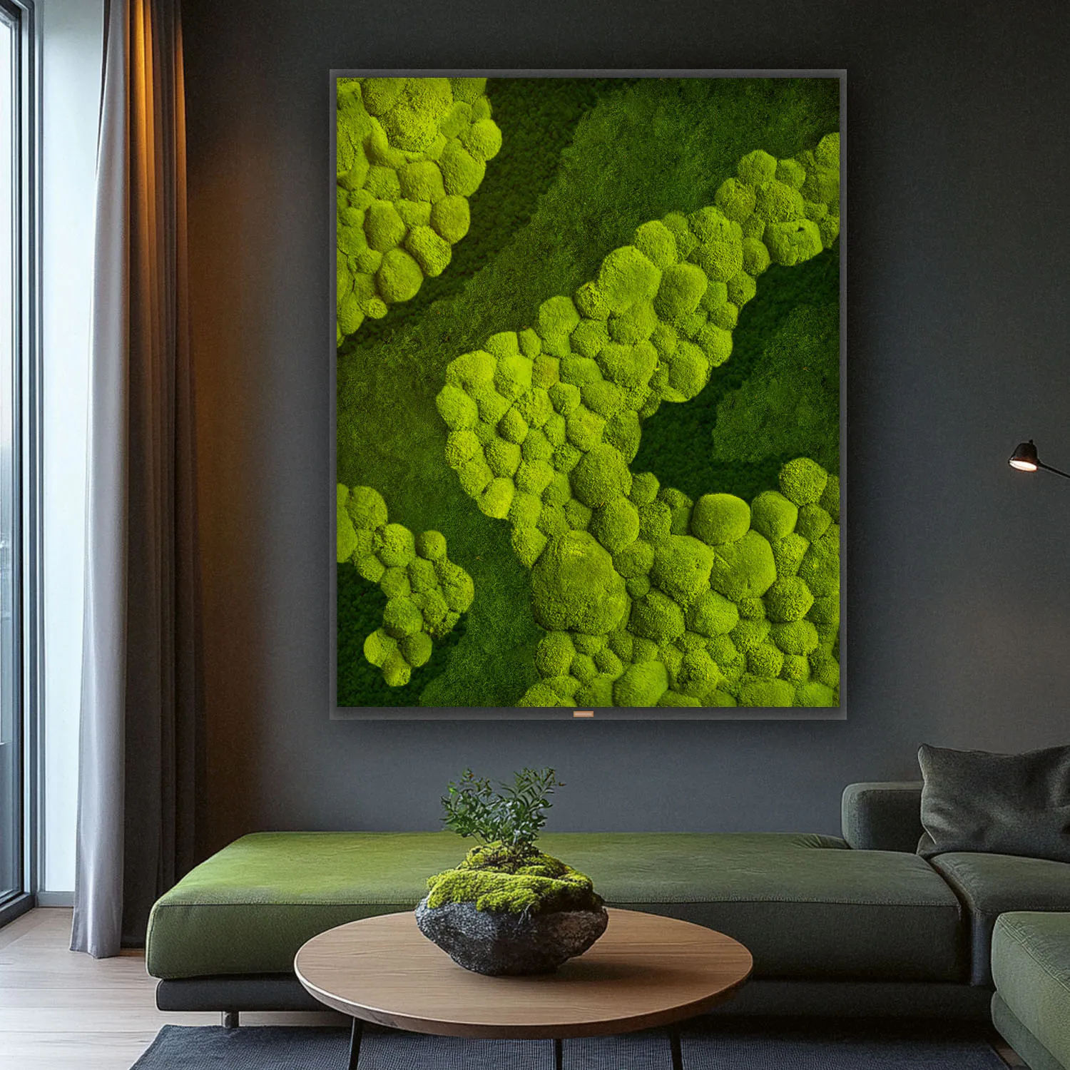 A framed moss picture made from real moss above the sofa in a modern living room