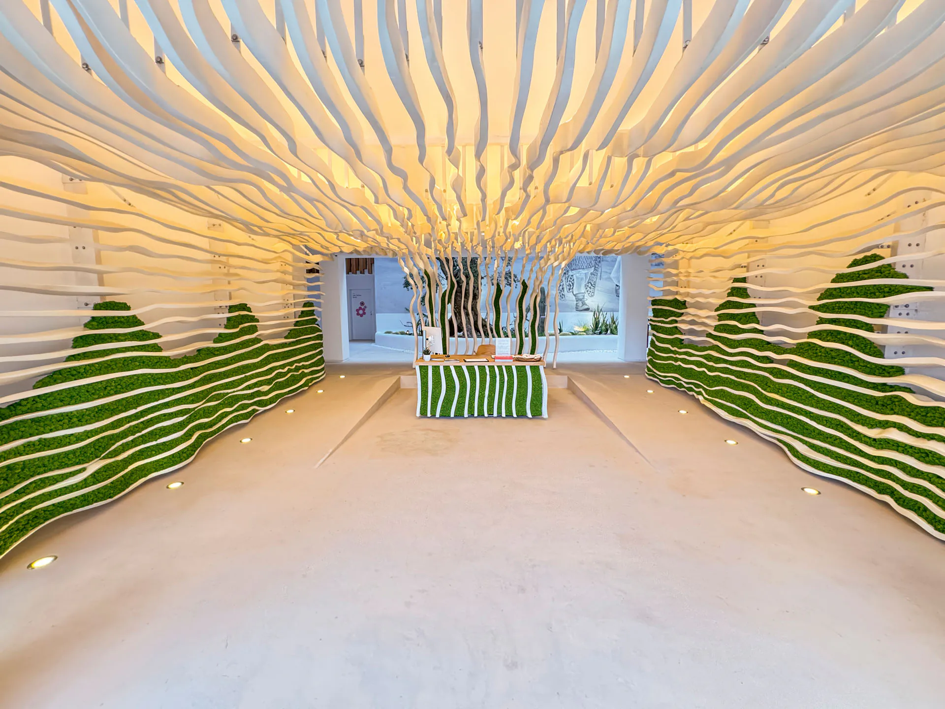 A moss wall in a showroom’s exhibition space