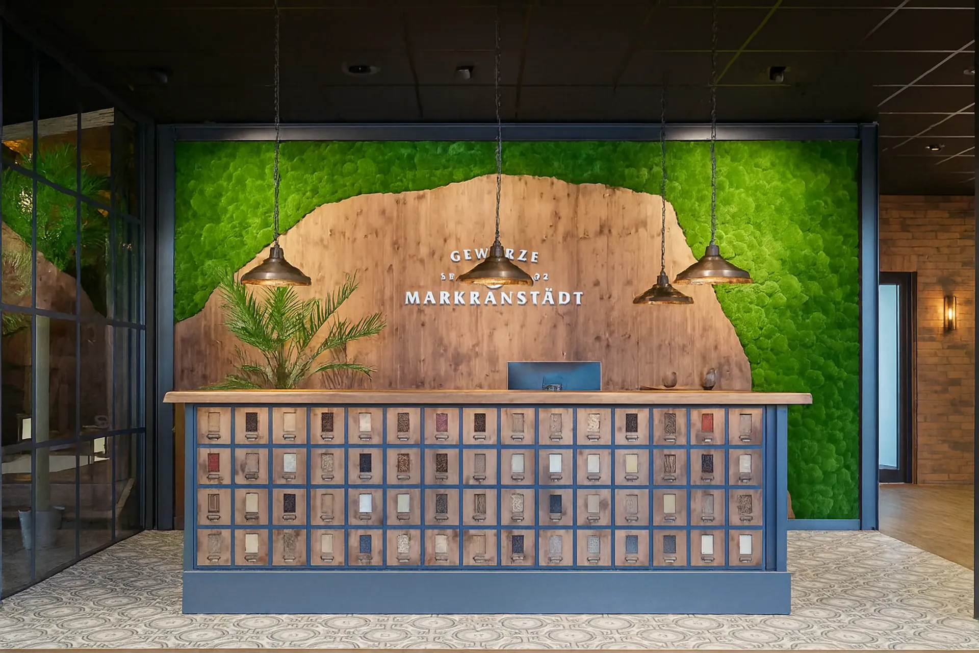 Logo made of moss, Showroom reception, Markranstädt — Logo made of moss by MOOSMOOS