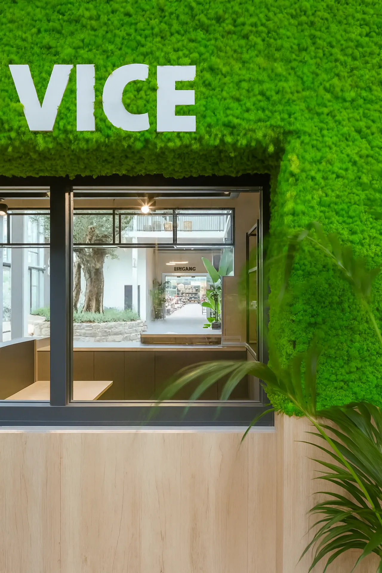 Logo made from moss; ‘Moos’ lettering — Logo made from moss by MOOSMOOS