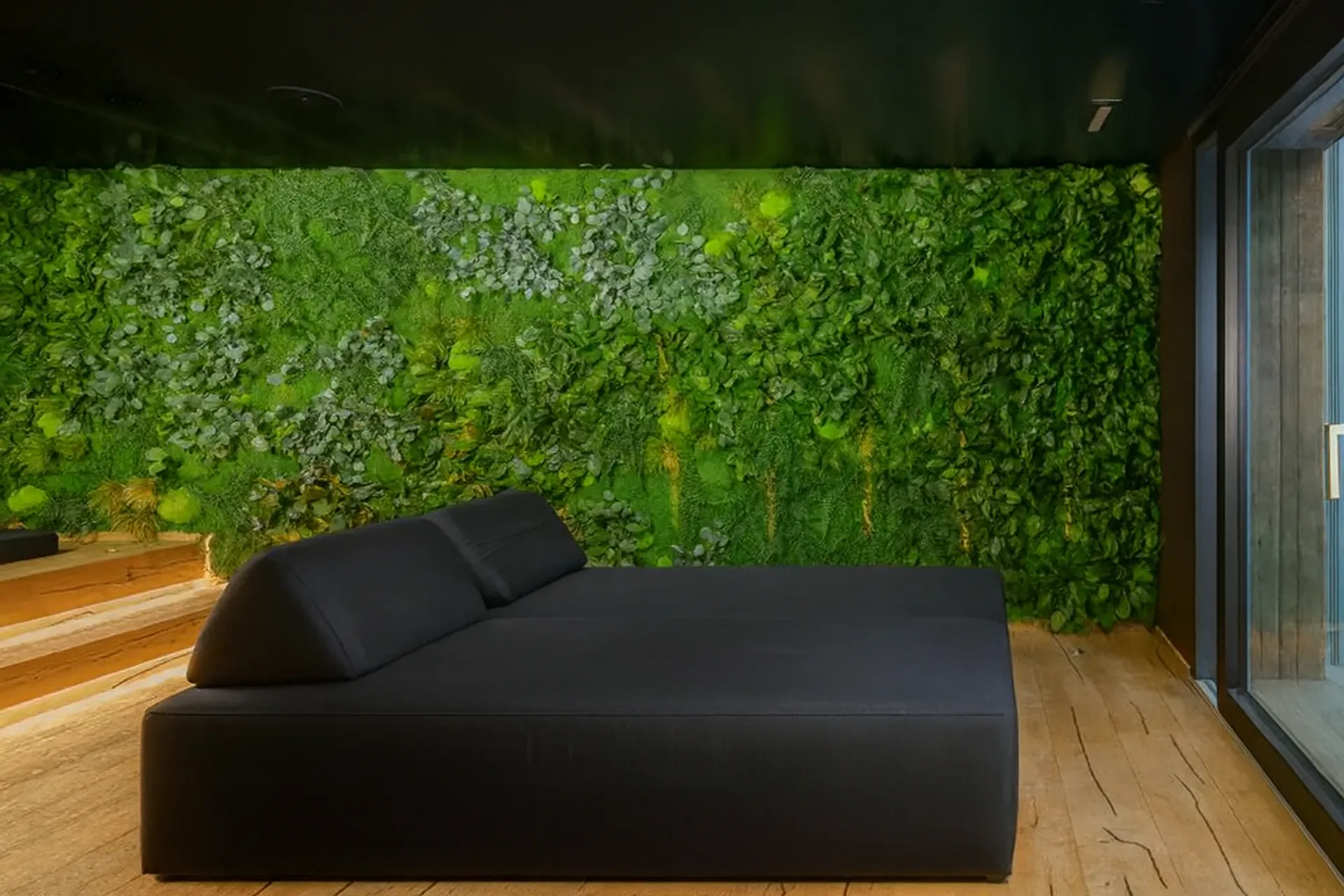 Moss wall Relaxation Area Black Sofa — Wall greenery by MOOSMOOS