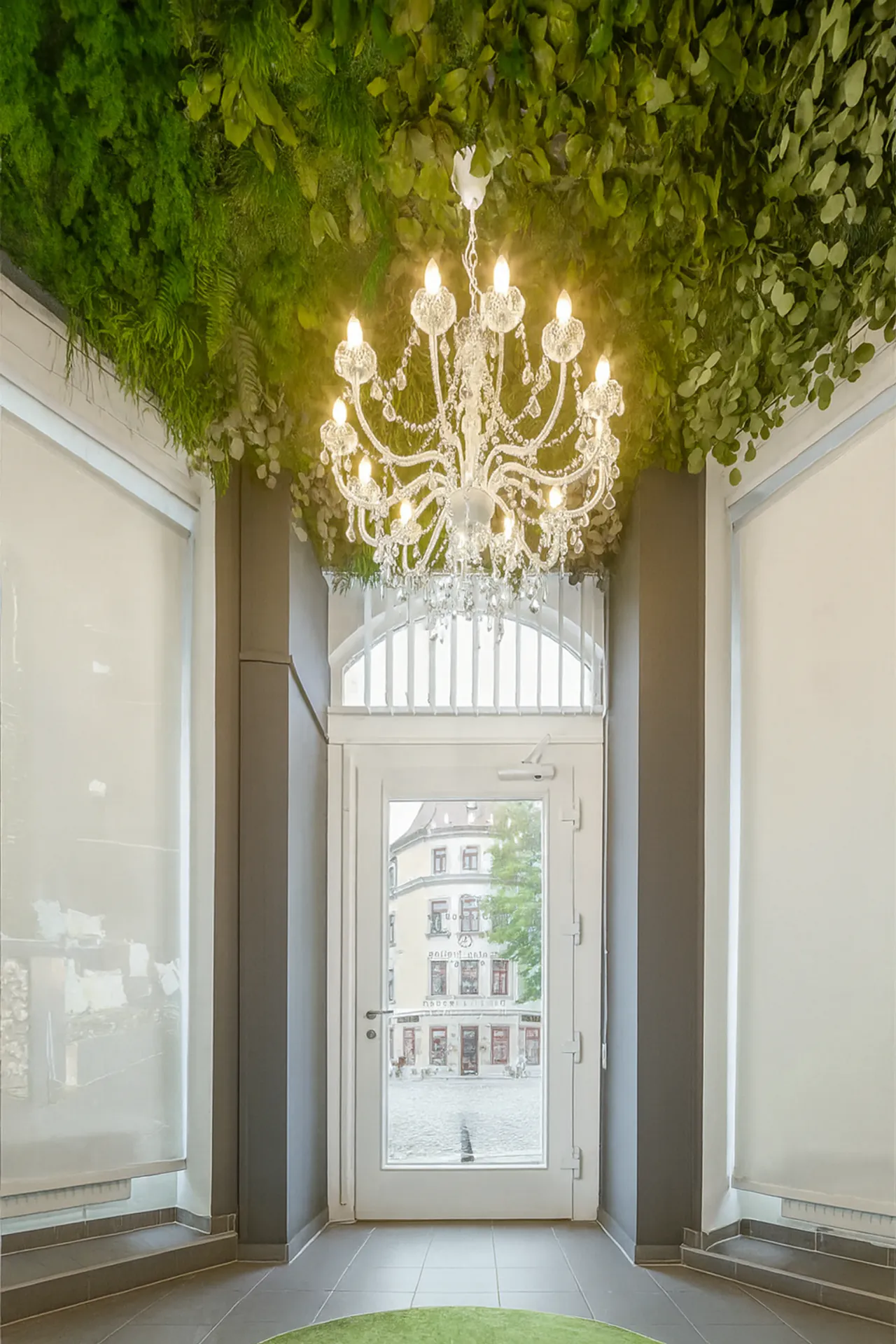 A green ceiling and wall surface made from preserved moss in a reception area