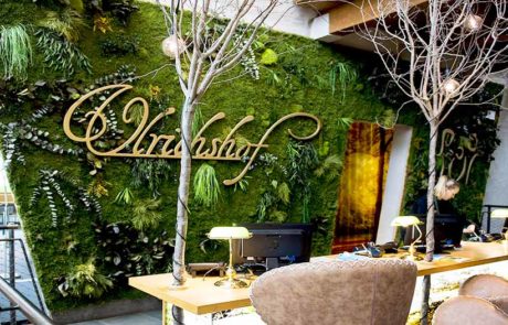 Jungle moss wall with logo Hotel Ulrichshof
