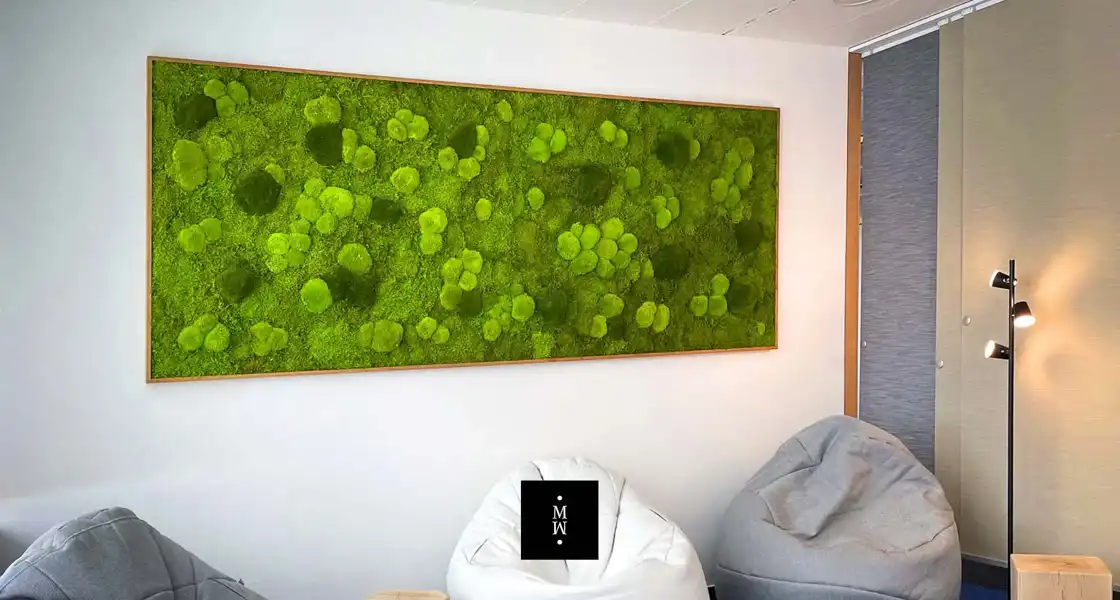 a green wall art on a wall