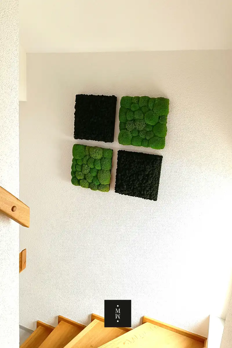 a wall with green and black squares