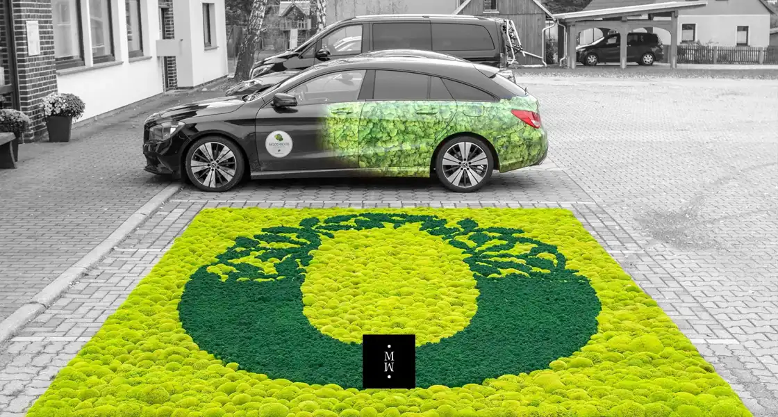 a car parked next to a rug