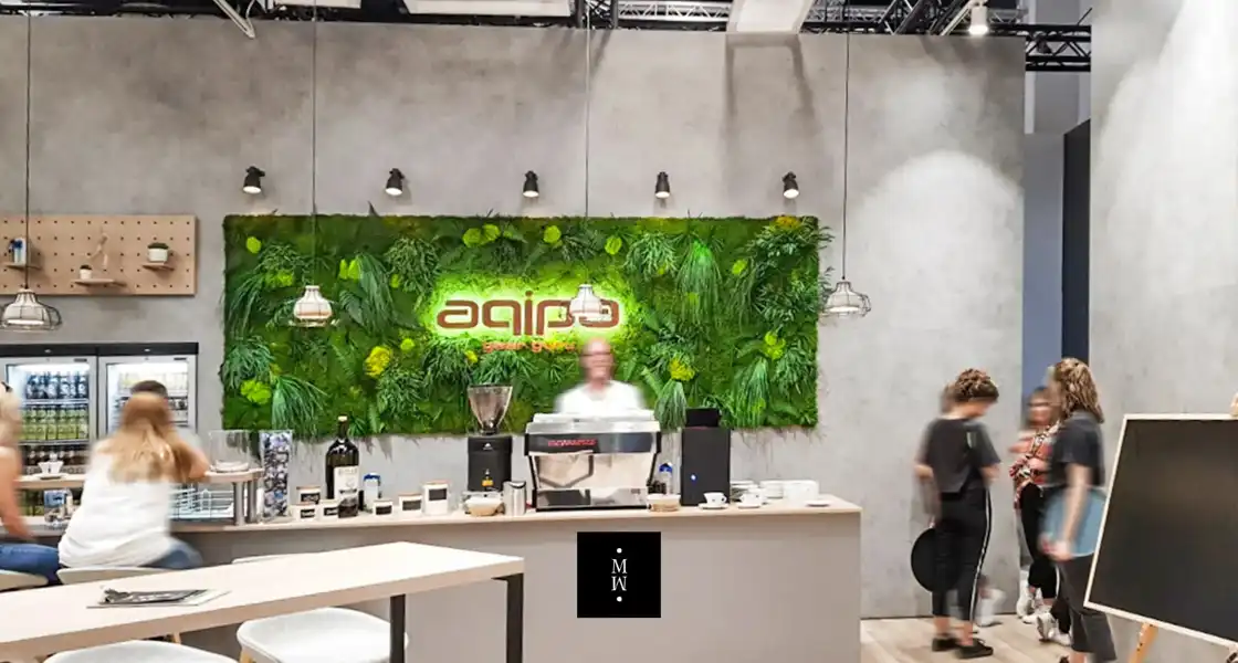 a man standing behind a counter