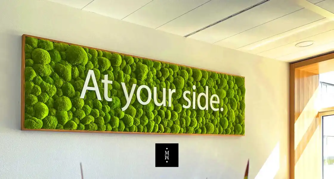 a green sign on a wall