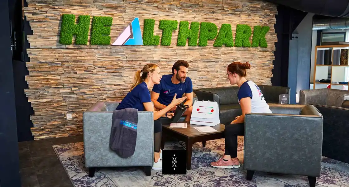 a group of people sitting on a couch