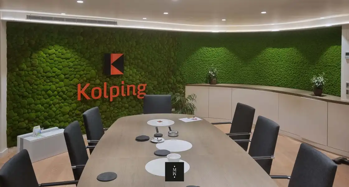 a room with a table and chairs