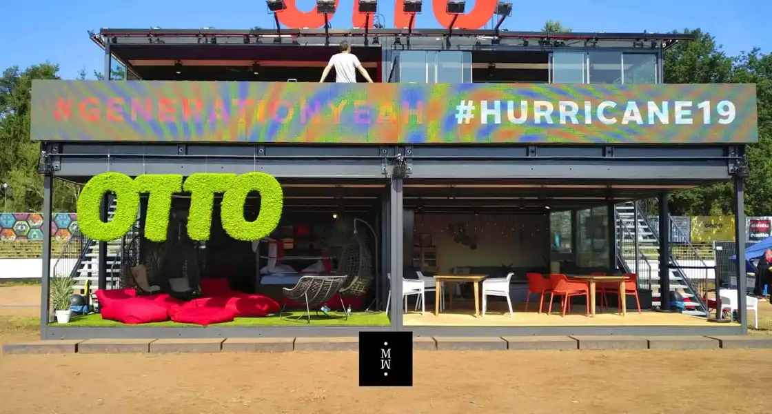 a man standing on a balcony