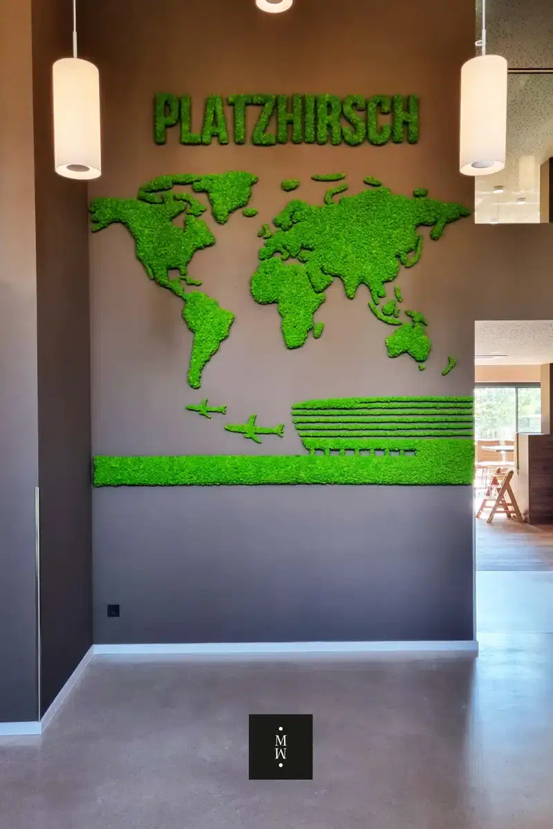 a wall with a map of the world and text