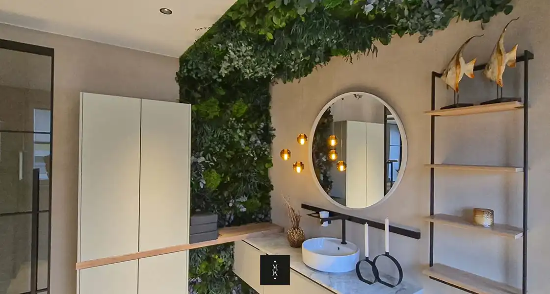 a bathroom with a mirror and plants