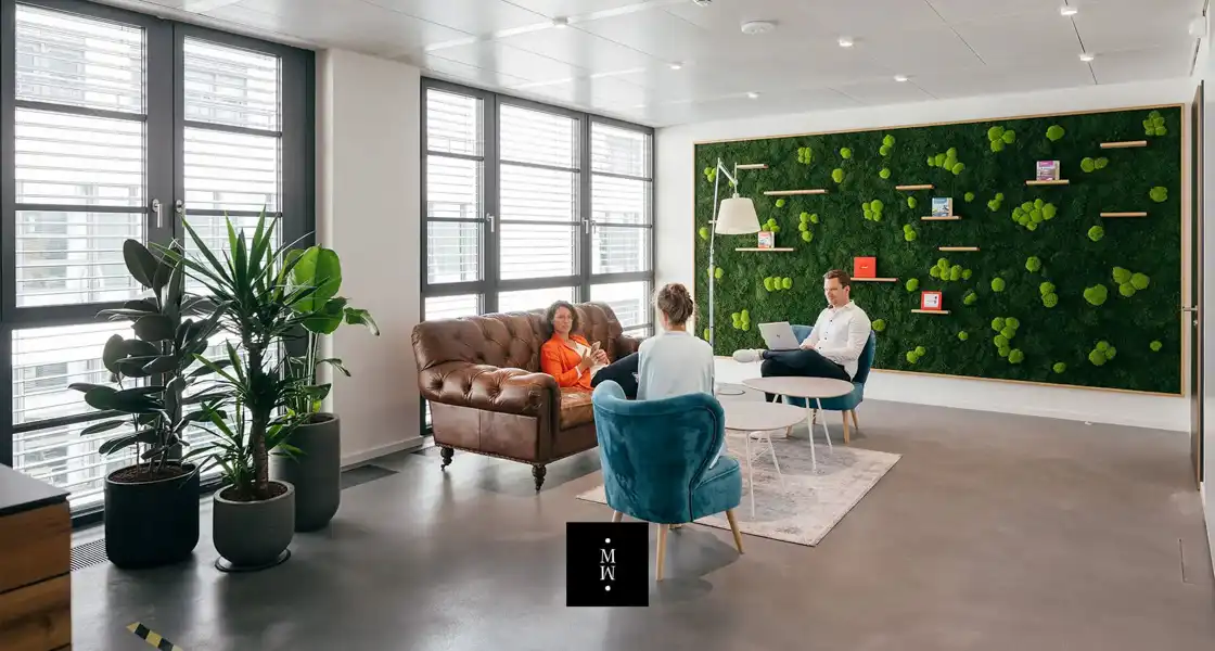 a group of people sitting in a room