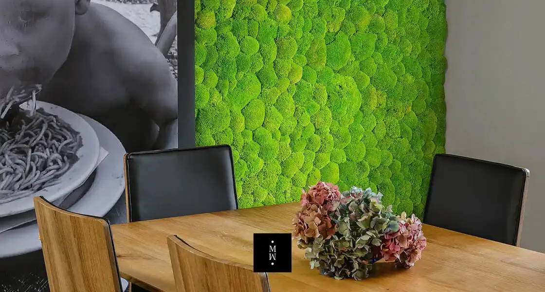 a table with a vase of flowers on it