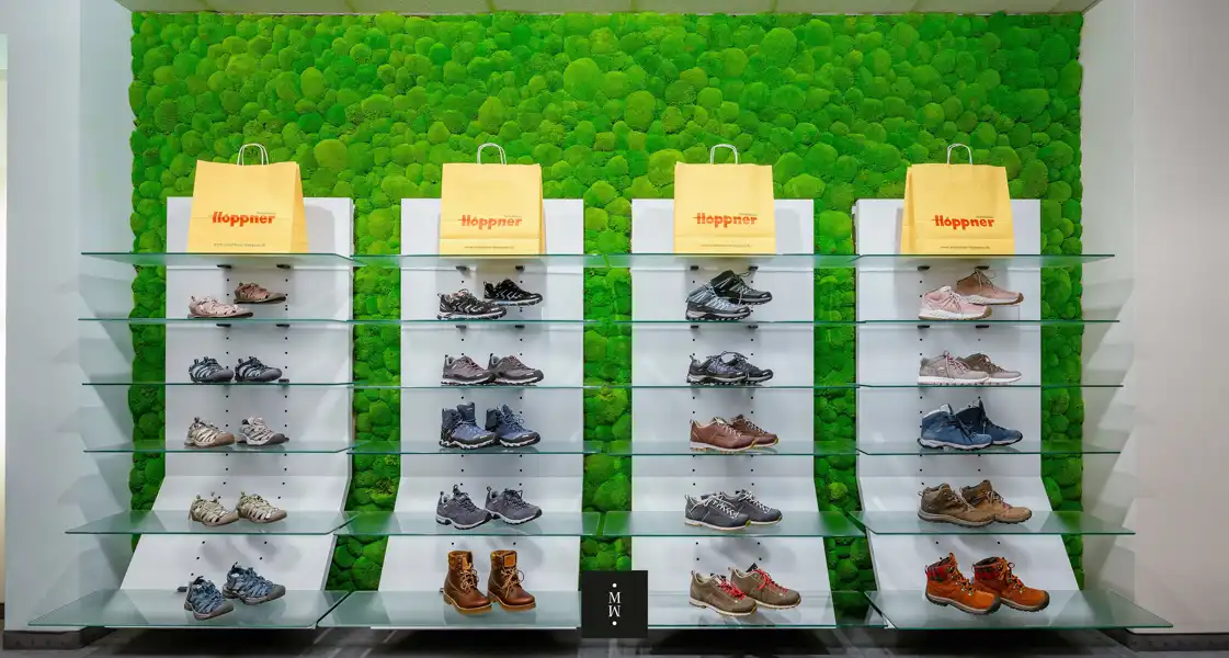 a display of shoes on shelves