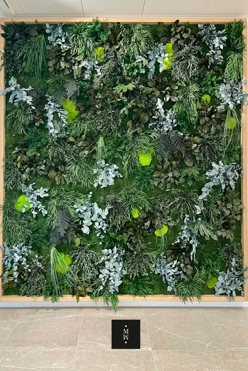 a wall of plants and flowers