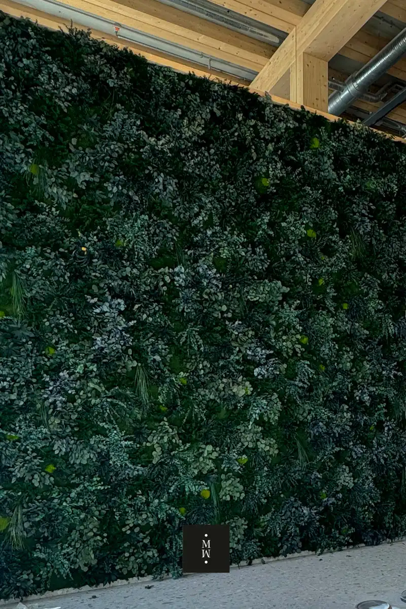 a green wall with plants