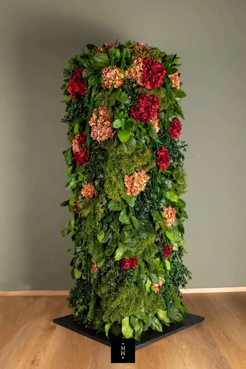 a tall plant with flowers